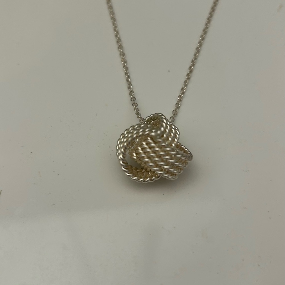 Elegant Silver Knot Pendant Necklace